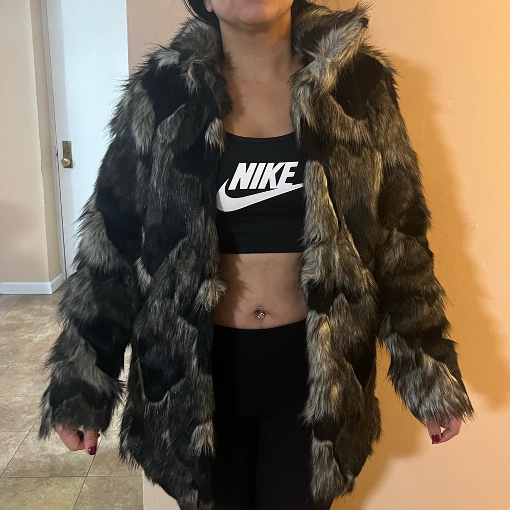 Black and gray faux fur coat. Like new, size Small.